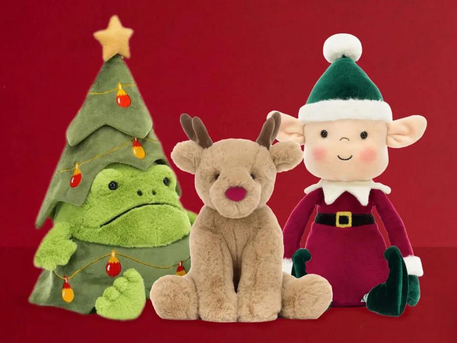 Jellycat plush Ricky Rain Frog Christmas tree, a peanut reindeer, and a snowman.